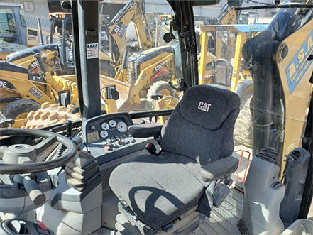 Operator's seat of a Caterpillar excavator heavy machinery loader backhoe for sale by westrax machinery near corona ca