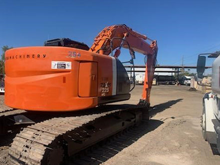 Orange excavator on a construction site heavy machinery for sale near corona ca by westrax machinery