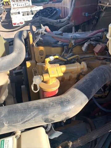 Close-up of a mechanical engine with visible components and wiring medium-duty truck Freightliner Business Class for sale near Corona CA at Westrax Machinery