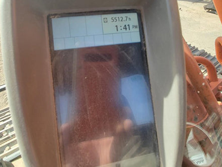 Display screen of a piece of machinery showing hours and time heavy machinery for sale near corona ca by westrax machinery