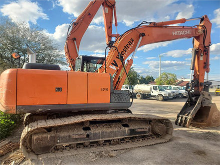 Orange Hitachi excavator on a construction site heavy machinery for sale near corona ca by westrax machinery