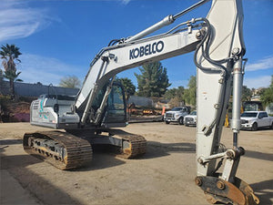 Kobelco SK210 hydraulic excavator bucket digging heavy machinery for sale near Corona CA at Westrax Machinery